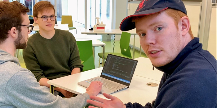 Gustav Gamst Larsen, Lukas Leindals, and Peter Grønning - DTU students at the bachelor study Artificial Intelligence and Data. Credit: Hanne Kokkegård, DTU Compute